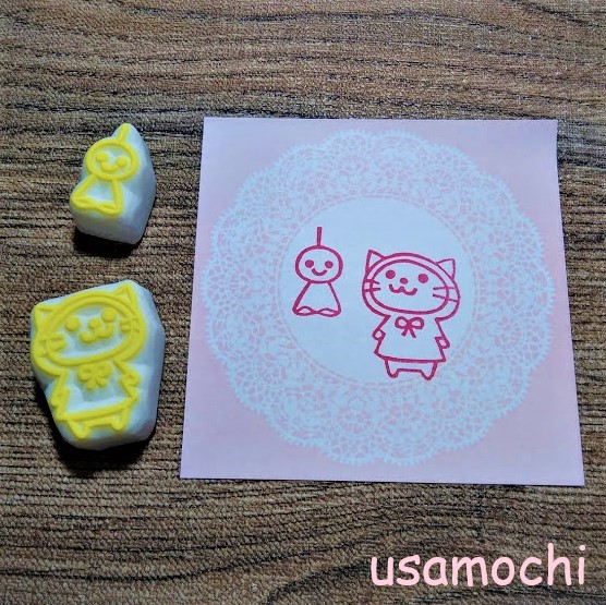 レインコートの猫とてるてる坊主 消しゴムはんこ  iichi ハンドメイド 
