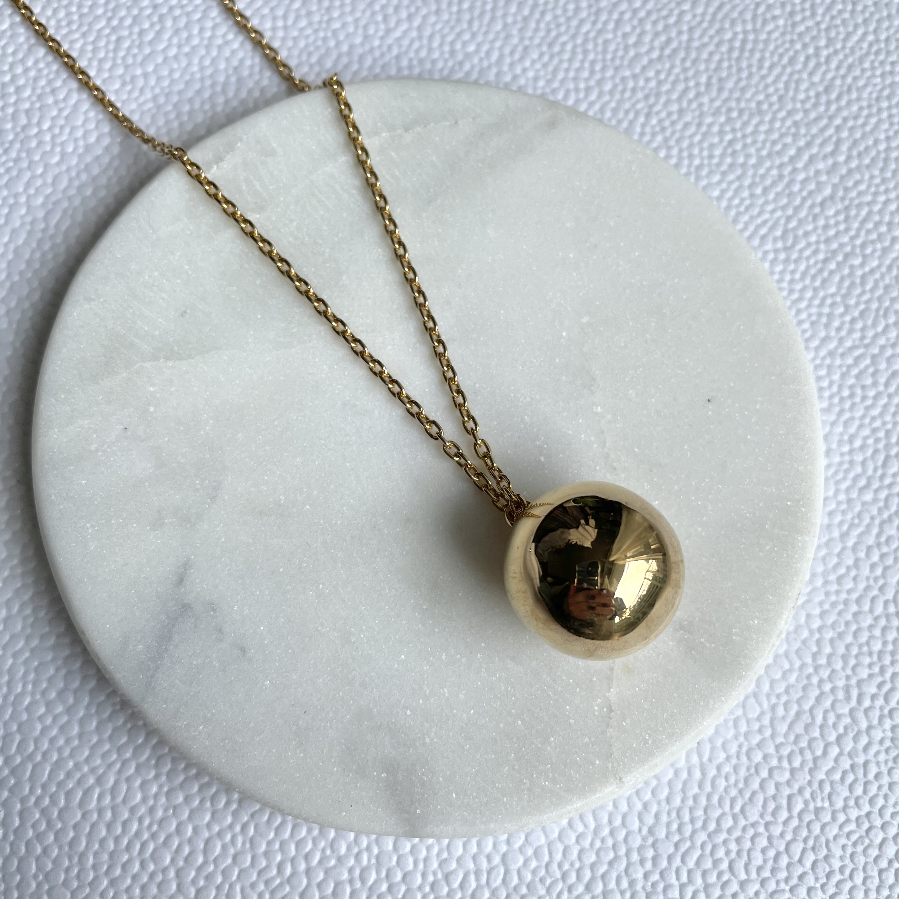 gold full moon pendant