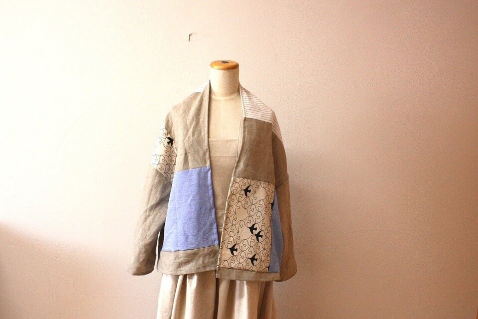 パッチのドロップショルダーカーデ