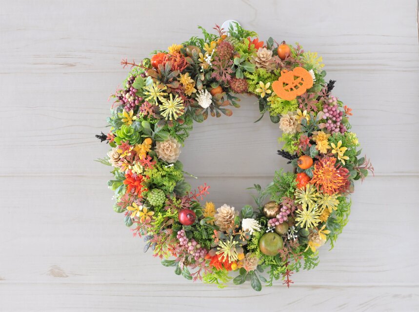 ミニパンプキンとローズヒップ　オレンジカラーのリース