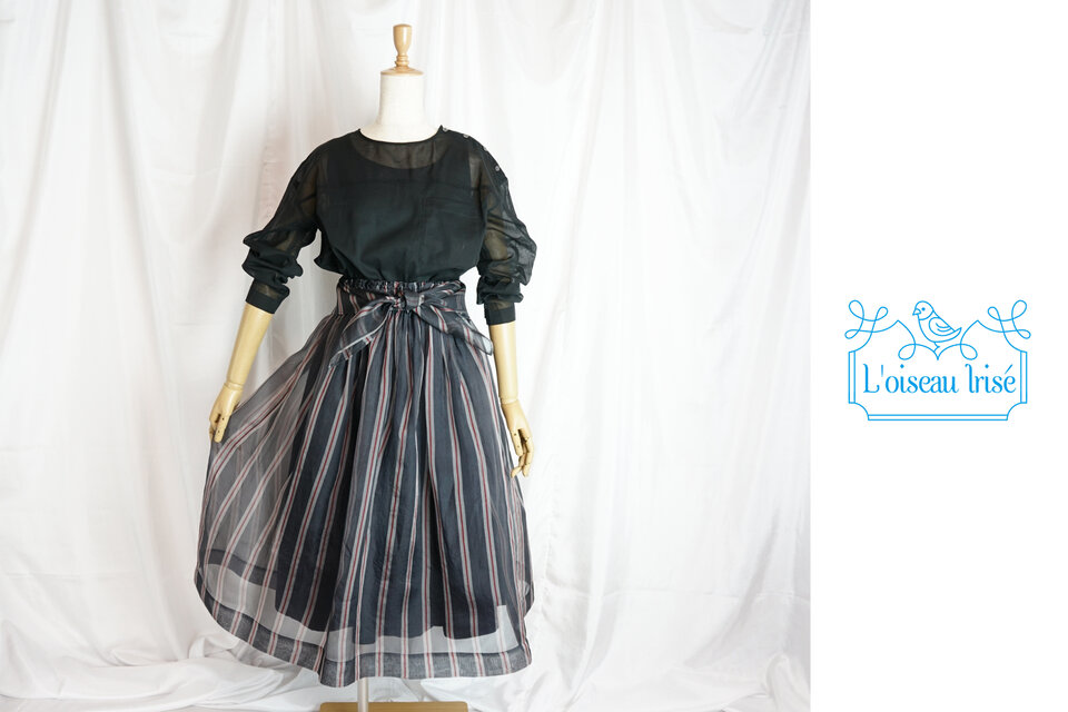 プレッピーなギャザースカート　ミモレ