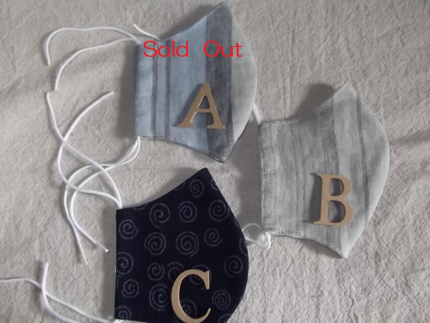 リネンのストライプ柄と渦巻き柄の立体マスク