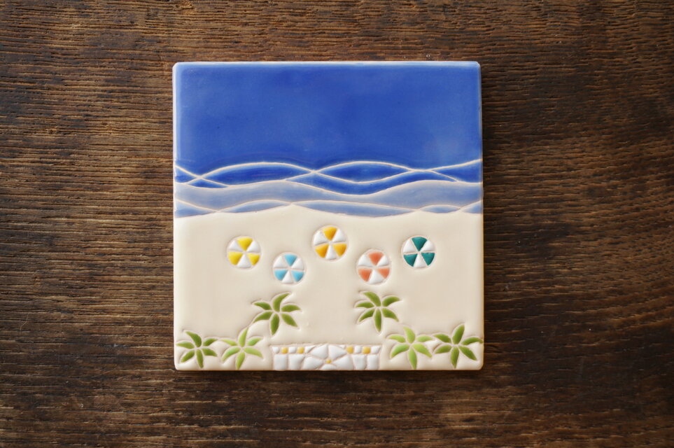 海辺のパラソル  Parasol Playero