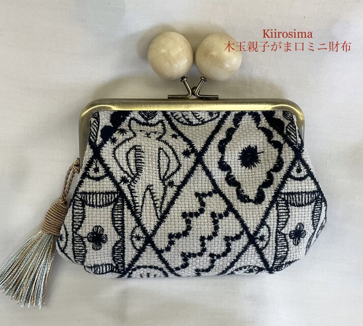 ミナペルホネン　シンフォニー　木玉親子がま口ミニ財布　
