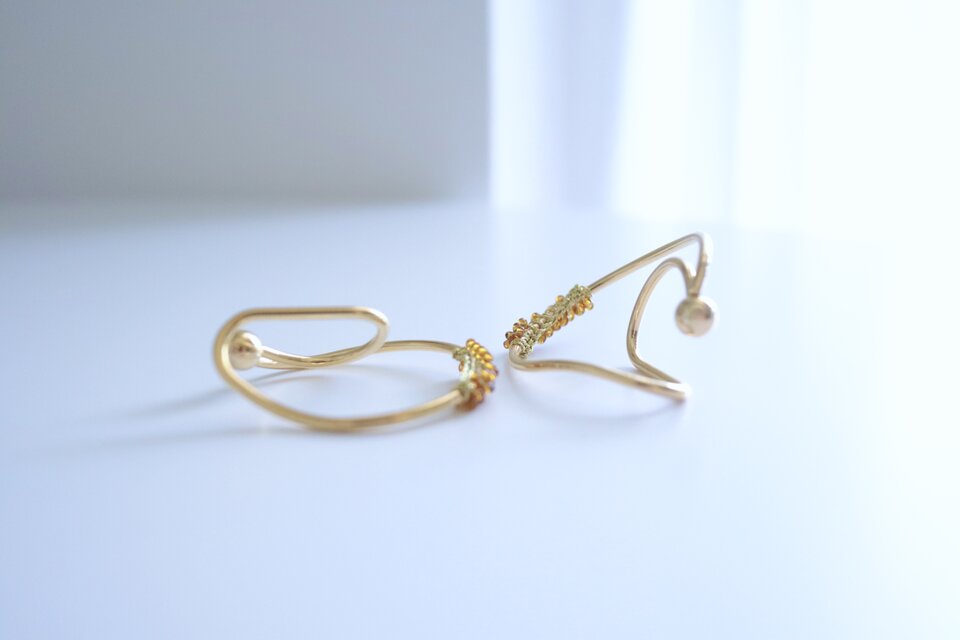 Orange lace egg , ear cuff