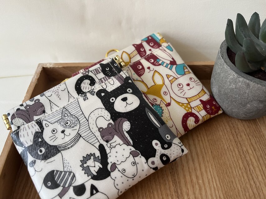 バネ口ラミネートポーチ　動物いっぱい