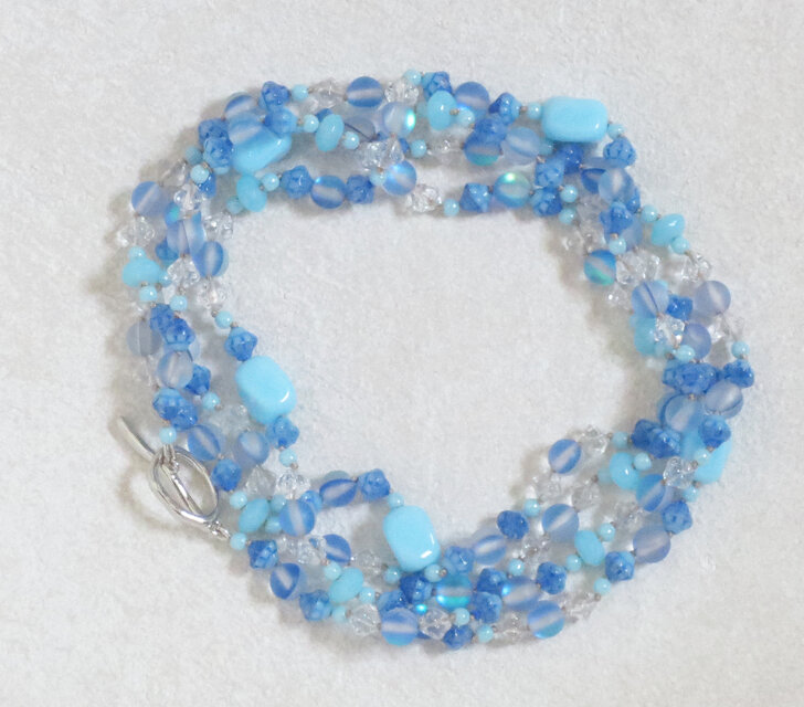 Blue sparkling オールノット仕上げのロングネックレス