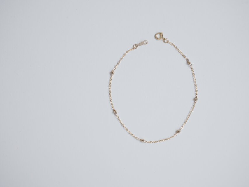 星屑 ｜14kgf 華奢なチェーンのゴールドブレスレット 【 長さオーダー可能 】