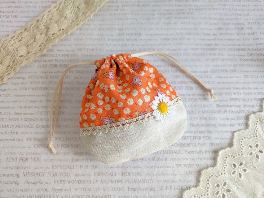 可愛い花柄のミニ巾着(オレンジ）