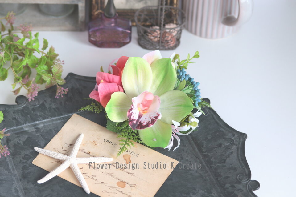 黄緑のシンビジュームとプルメリのヘアクリップ フラダンス 浴衣髪飾り