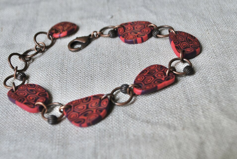 うずまき模様のブレス　ピンク紫ゴールド