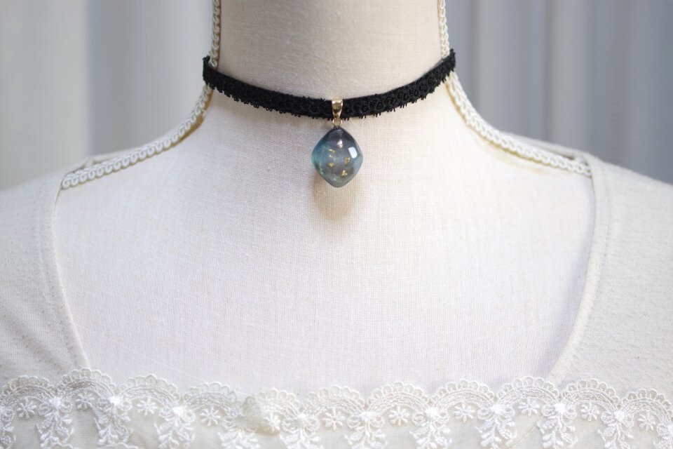 クアラントットノベルティミラー黒と金のリボン装飾 クアラントットノベルティミラー黒と金のリボン装飾