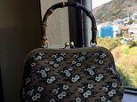 竹の手がま口手提げ 花柄の丸帯