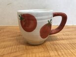トマトのマグカップの画像