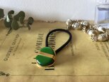 Italy green asymmetry button hair accessoryの画像