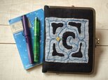 リネン１００％アイヌ刺繍　薄手のA6手帳・母子手帳・ブックカバーにもの画像