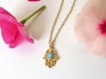 Gold hamsa with blue eyeハムサネックレスの画像