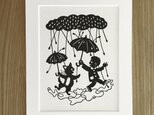 ろくとくろの切り絵「雨に唄えば」の画像