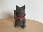 黒猫のまねき猫の画像
