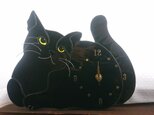 ステンドグラスの黒猫時計の画像