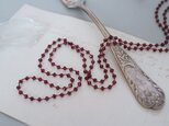 long necklace silk ガーネットの画像