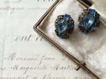 Blue and decorative earringsの画像