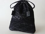 black denim random lace kinchakuの画像