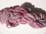 ピンクコイルな糸の画像