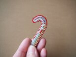 ぐるぐるブローチ ステッキの画像