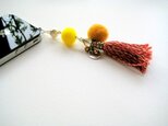 タッセルイヤホンジャックピアス　イエロー×ブラウン