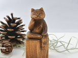 弥勒猫　木彫り　置物　オブジェの画像