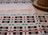ムンカベルテの手織りランチョンマット（ブラック×ターコイズブルー）の画像