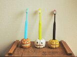 カボチャの歯ブラシ立て　だいだい（左）