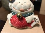 招き猫。猫の置物。の画像