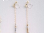 medium swing / sv&gold -clip earring-の画像