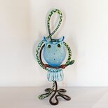 ふくろうとト音記号のフラワーベース