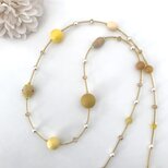 マスタード イエローの大ぶりロングネックレス