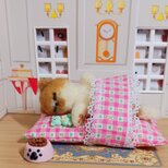 羊毛フェルト 気持ちよさそうにフトンに寝ている猫 ちゃんの画像