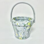ソフトライラック色の、デイジーと野の花の小物入れのの画像