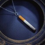 吸い殻のペンダント（銀）の画像