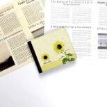 （送料無料）二つ折り財布（かぶせ蓋タイプ）【水彩調ひまわり】（名入れ可）の画像