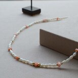 桃珊瑚（ピンク珊瑚）、池蝶貝真珠のやわらかな佇まいのネックレス