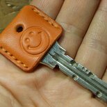 スマイル刻印のキーカバー オレンジ