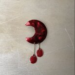 Vintage 80s-90s retro red moon swing enamel brooch