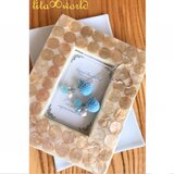 さわやかブルーのボンボンピアス