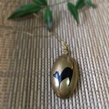 黒猫のペンダント