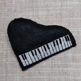 ピアノのブローチの画像