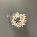 すみれのリースコサージュ(革)の画像