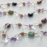 グレーのシルク糸とアースカラーの天然石のネックレス