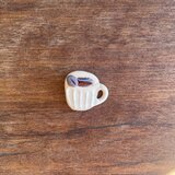 コーヒー豆とカップのブローチの画像